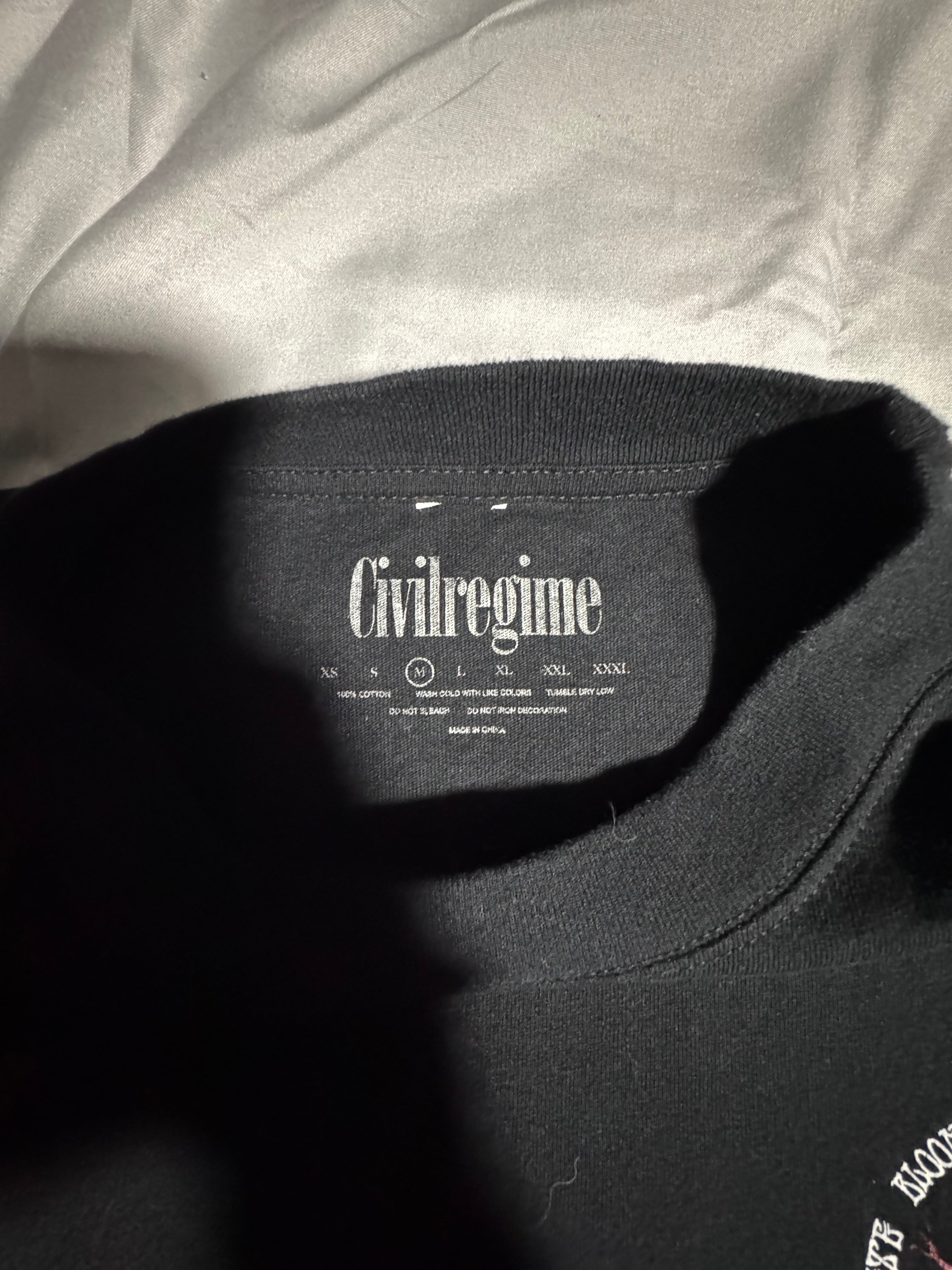 Black tee shirt designer